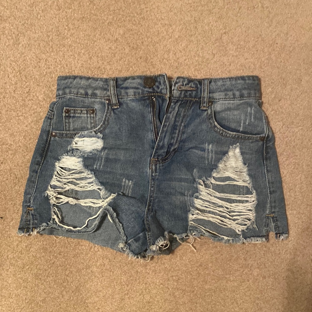 High rise, distressed jean shorts.